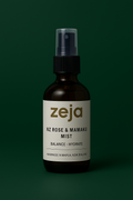 Zeja NZ Rose & Mamaku Mist bottle on a dark green background